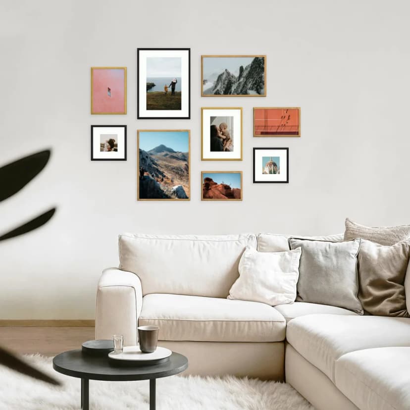 Mixed arrangement of various frame sizes in both landscape and portrait orientations creating a quilt-like pattern